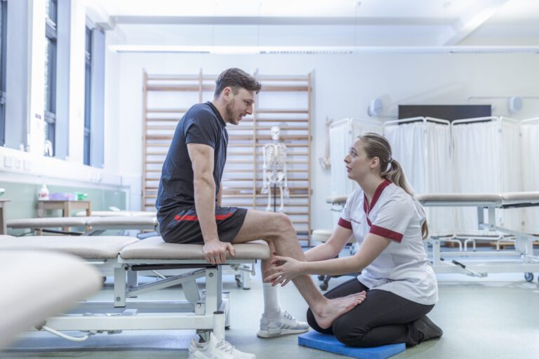 physiotherapist with patient in hospital 2025 04 04 11 23 56 utc